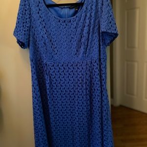 Lace blue short sleeve dress with empire waist.